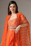 Yashodhara_Orange Organza Embroidered Pattern Asymmetric Draped Skirt Set _at_Aza_Fashions