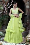 Buy_Nitisha Kashyap Official_Green Georgette, Net, Silk Beads, Mirrors, Zari Embroidered Tiered Lehenga Set _at_Aza_Fashions