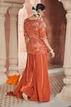 Shop_Megha Pitti_Orange Bemberg Crepe Hand Embroidered Floral Notched Kurta Sharara Set _at_Aza_Fashions