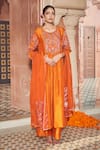 Buy_Megha Pitti_Orange Bemberg Silk Hand Embroidered Floral Round Kurta Pant Set _at_Aza_Fashions