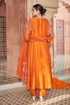 Shop_Megha Pitti_Orange Bemberg Silk Hand Embroidered Floral Round Kurta Pant Set _at_Aza_Fashions