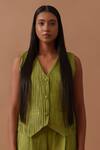 Buy Stoique Green Handloom Cotton V-neck Sunflower Pleated Waistcoat Online at Aza Fashions Buy_Stoique_Green Handloom Cotton V-neck Sunflower Pleated Waistcoat _Online_at_Aza_Fashions