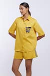 PALLAVI SWADI_Yellow Cotton Satin Hand Embroidered Thread Pocket Shirt And Shorts Set _at_Aza_Fashions