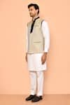 Aryavir Malhotra_Beige Jute Textured Nehru Jacket _at_Aza_Fashions