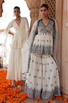 Buy_PREEVIN_White Peplum Kurta And Sharara Cotton Mulmul Embroidered Floral Set _at_Aza_Fashions