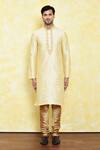Buy_Samyukta Singhania_Gold Art Silk Embroidered Thread Placket Kurta And Beige Churidar Set_Online_at_Aza_Fashions