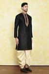 Samyukta Singhania_Black Art Silk Embroidered Floral Placket Kurta Set _at_Aza_Fashions