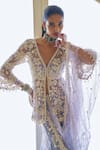 Seema Gujral_Purple Net Embroidered Sequin V-neck Floral Vine Peplum Sharara Set  _Online_at_Aza_Fashions