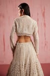 Shop_Roqa_Ivory Net Sequin Embroidery Crop Jacket Wide Collar Aiden Bloom Lehenga Set_at_Aza_Fashions
