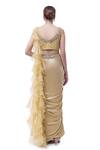 Shop Onaya Beige Lurex Embellished Cheed V Waist Pre-stitched Ruffle Saree With Blouse at Aza Fashions Shop_Onaya_Beige Lurex Embellished Cheed V Waist Pre-stitched Ruffle Saree With Blouse_at_Aza_Fashions