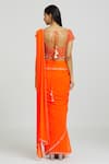 Nitisha Kashyap Official_Orange Silk Embroidered Beads V Neck Border Saree With Blouse  _Online_at_Aza_Fashions