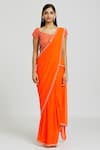 Buy_Nitisha Kashyap Official_Orange Silk Embroidered Beads V Neck Border Saree With Blouse  _Online_at_Aza_Fashions