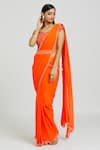 Shop_Nitisha Kashyap Official_Orange Silk Embroidered Beads V Neck Border Saree With Blouse  _Online_at_Aza_Fashions