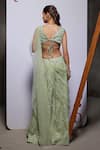 Divya Aggarwal_Green Organza Embellished Pearl V Neck Eliora Draped Sharara Saree With Blouse _Online_at_Aza_Fashions