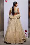 Shop_Divya Aggarwal_Ivory Organza, Muslin, Tulle Pearls Esther Embellished Bridal Lehenga Set _at_Aza_Fashions