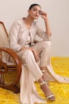 Shop_Miku Kumar_Ivory Silk Embroidery Sequin Keyhole Tahira Stripe Jacket Pant Set _Online_at_Aza_Fashions