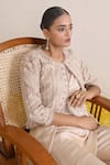 Miku Kumar_Ivory Silk Embroidery Sequin Keyhole Tahira Stripe Jacket Pant Set _at_Aza_Fashions