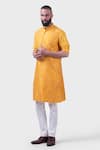 Buy_Raghavendra Rathore Jodhpur_Yellow Silk Textured Pintucked The Marigold Kurta _at_Aza_Fashions