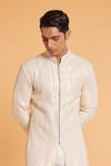 Buy Siddartha Tytler Ivory Silk, Lycra Sequins Embellished Sherwani With Pant Online at Aza Fashions Buy_Siddartha Tytler_Ivory Silk, Lycra Sequins Embellished Sherwani With Pant _Online_at_Aza_Fashions