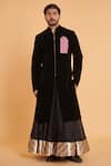 Buy Siddartha Tytler Black Velvet, Silk Embroidery Crest Sherwani With Flared Pant at Aza Fashions Buy_Siddartha Tytler_Black Velvet, Silk Embroidery Crest Sherwani With Flared Pant _at_Aza_Fashions