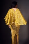 Shop_Chisel by Meghna Ramrakhiya_Yellow Stretchable Net Hand Embellished Sequins Bodycon Cape Gown  _at_Aza_Fashions