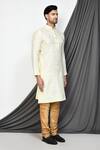 Aryavir Malhotra_Cream Kurta Poly Cotton Paisley Pattern Set _at_Aza_Fashions