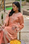 Saangi_Peach Modal, Satin Sequins, Beads, Floral Embroidered Kurta And Dhoti Pant Set_at_Aza_Fashions