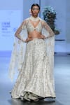 Buy_Paulmi and Harsh_Ivory Net Embroidery Zardozi Plunge V Floral Tail Cut Lehenga Set  _Online_at_Aza_Fashions