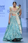 Paulmi and Harsh_Blue Blouse And Lehenga Russian Jacquard Woven Floral Leaf Bridal Set  _Online_at_Aza_Fashions