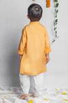 Shop_Rage Attire-Sweta Saria_Peach Cotton, Bamboo Embroidery Sunflower Kurta And Pyjama Set _at_Aza_Fashions