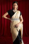 Shop_Tasuvure Indes_Black Rich Pleated Silk Solid V Neck Reyna Saree With Blouse _at_Aza_Fashions