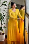 Buy_LABEL AISHWARYRIKA_Yellow Georgette Hand Embroidered Chikankari Thread Firefly Kurta Palazzo Set _at_Aza_Fashions