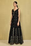 Khwaab by Sanjana Lakhani_Black Raw Silk Hand Embroidered Sequins V Neck Gown_at_Aza_Fashions
