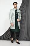 Buy_Arihant Rai Sinha_Green Silk Woven Bloom Jaal Jacquard Layered Sherwani With Dhoti Pant _at_Aza_Fashions