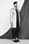 Arihant Rai Sinha_Green Silk Woven Bloom Jaal Jacquard Layered Sherwani With Dhoti Pant _at_Aza_Fashions