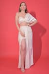 Buy_Ahi Clothing_Off White Shimmer Lycra Kodi Tassels One Shoulder Twisted Top And Draped Skirt Set _at_Aza_Fashions