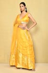 Buy_Samyukta Singhania_Yellow Banarasi Brocade Embroidered Floral V Neck Lace Blouse Lehenga Set _at_Aza_Fashions