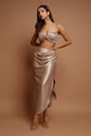 Ahi Clothing_Gold Shimmer Lycra Plain Asymmetric Neck Metallic Draped Top And Skirt Set_Online_at_Aza_Fashions