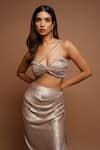 Buy_Ahi Clothing_Gold Shimmer Lycra Plain Asymmetric Neck Metallic Draped Top And Skirt Set_Online_at_Aza_Fashions