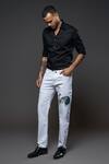 Shop_Rohit Bal_Off White Denim Embroidery Dancing Cock Placement Jeans _at_Aza_Fashions