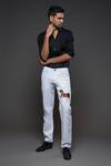 Shop Rohit Bal Off White Denim Embroidery Horse Placement Jeans at Aza Fashions Shop_Rohit Bal_Off White Denim Embroidery Horse Placement Jeans _at_Aza_Fashions