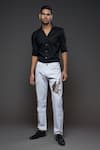 Buy Rohit Bal Off White Denim Embroidery Flying Eagle Placement Jeans at Aza Fashions Buy_Rohit Bal_Off White Denim Embroidery Flying Eagle Placement Jeans _at_Aza_Fashions