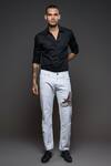 Shop Rohit Bal Off White Denim Embroidery Eagle Placement Jeans at Aza Fashions Shop_Rohit Bal_Off White Denim Embroidery Eagle Placement Jeans _at_Aza_Fashions