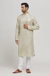 Buy_Aham-Vayam_Ivory Cotton Mirrors, Embroidery Swarna Kurta And Churidar Set _at_Aza_Fashions