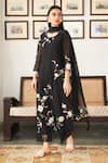 Buy_Vaayu_Black Muslin Cotton Embroidery Floral Applique Round Kurta Set  _at_Aza_Fashions