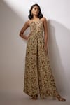 Buy_Nadima Saqib_Beige Crepe Tassels Halter Neck Printed Tie-up Jumpuit _at_Aza_Fashions