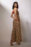Shop_Nadima Saqib_Beige Crepe Tassels Halter Neck Printed Tie-up Jumpuit _at_Aza_Fashions