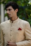 TAJIRI_Beige Linen Embroidered Floral Opulence Bandhgala Blazer Set _at_Aza_Fashions