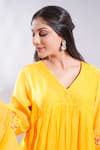 The White Tree Studio_Yellow Chanderi, Cotton, Lycra Embroidery Aftab Hem Anarkali And Leggings Set _at_Aza_Fashions