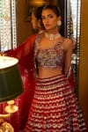 Shop_LASHKARAA_Red Lehenga And Blouse Velvet Embroidered Thread One Shoulder Set_Online_at_Aza_Fashions